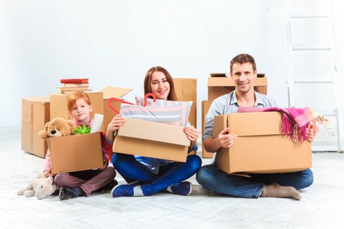 Prepared moving boxes and furniture ready for collection in Bexleyheath