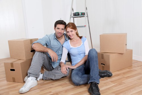 Professional movers handling office furniture and equipment locally