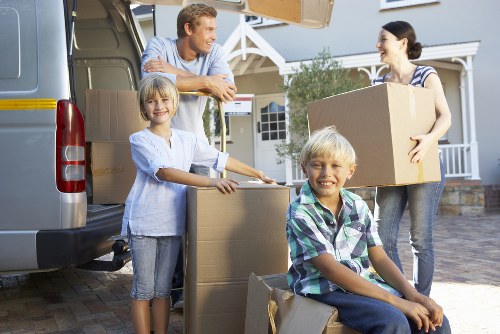 Packed boxes and furniture ready for local removals