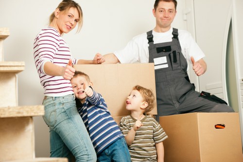Local moving team handling fragile items in a Bexleyheath home