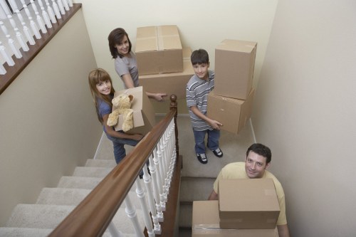 Careful unloading of boxes and appliances at a new home